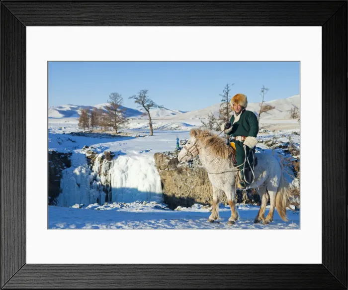 Framed Print : Mongolia, Ovorkhangai, Orkkhon Valley. A man sits on horseback by a frozen waterfall Framed Print : Mongolia, Ovorkhangai, Orkkhon Valley. A man sits on horseback by a frozen waterfall