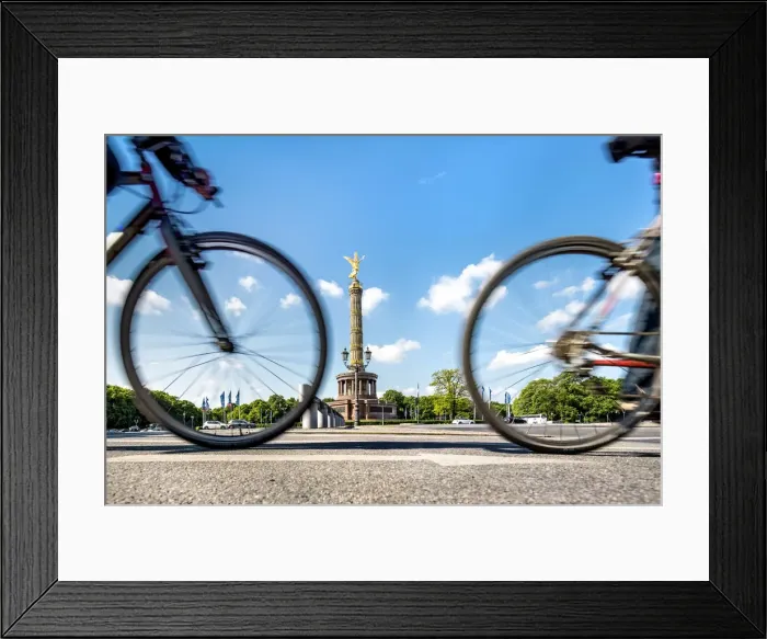 Framed Print : Cyclists in front of Siegessaaule, Berlin, Germany Framed Print : Cyclists in front of Siegessaaule, Berlin, Germany