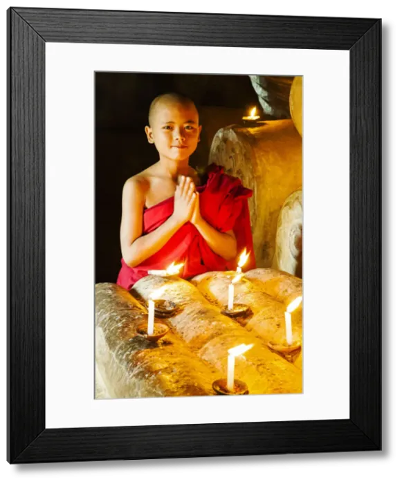Framed Print : A buddhist monk praying in the temple, Bagan, Burma / Myanmar Framed Print : A buddhist monk praying in the temple, Bagan, Burma / Myanmar