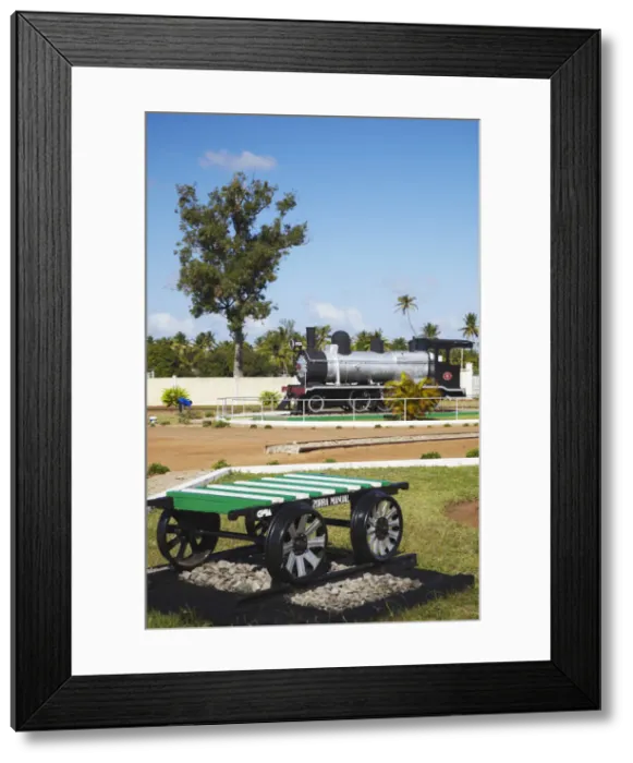 Framed Print : Train engine on display outside railway station, Inhambane, Mozambique Framed Print : Train engine on display outside railway station, Inhambane, Mozambique