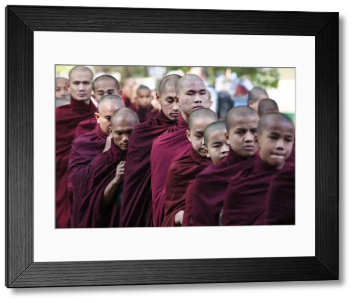 Framed Print : Buddhist monks lining up for lunch at Mahagandayon Monastery, largest Buddhist monastery Framed Print : Buddhist monks lining up for lunch at Mahagandayon Monastery, largest Buddhist monastery