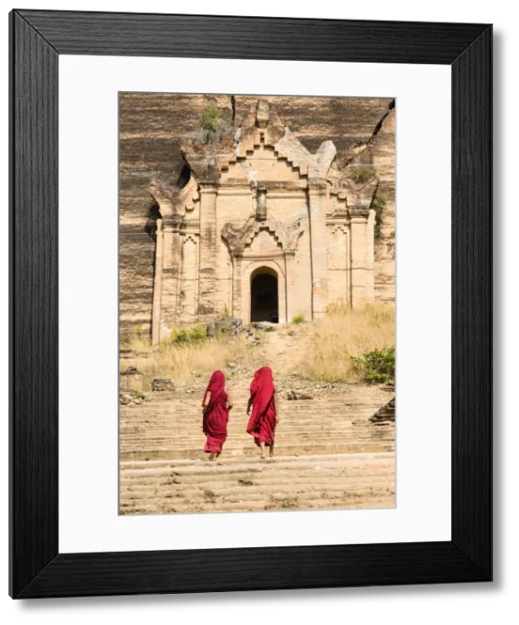 Framed Print : Buddhist novice monks walking by the Mingun Pahtodawgyi, unfinished monument stupa