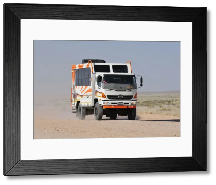 Framed Print : Africa, Namibia, Namib-Naukluft Park, Truck on a dusty road Framed Print : Africa, Namibia, Namib-Naukluft Park, Truck on a dusty road