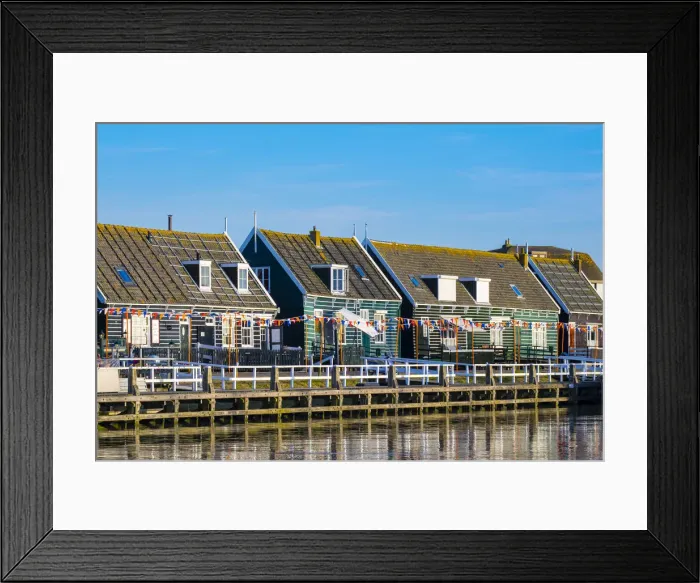 Framed Print : Netherlands, North Holland, Marken. Wooden buildings along the harbor in Havenbuurt Framed Print : Netherlands, North Holland, Marken. Wooden buildings along the harbor in Havenbuurt