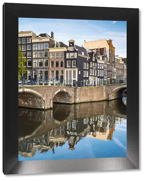Netherlands, North Holland, Amsterdam. Canal houses at the intersection of Keizersgracht