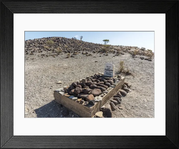 Framed Print : Africa, Namibia, Keetmanshop. The grave of a german soldier on the farm Mesosaurus fossil Framed Print : Africa, Namibia, Keetmanshop. The grave of a german soldier on the farm Mesosaurus fossil