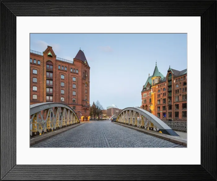 Framed Print : Germany, Hamburg, HafenCity. Historic warehouses in the Speicherstadt quarter at dusk Framed Print : Germany, Hamburg, HafenCity. Historic warehouses in the Speicherstadt quarter at dusk
