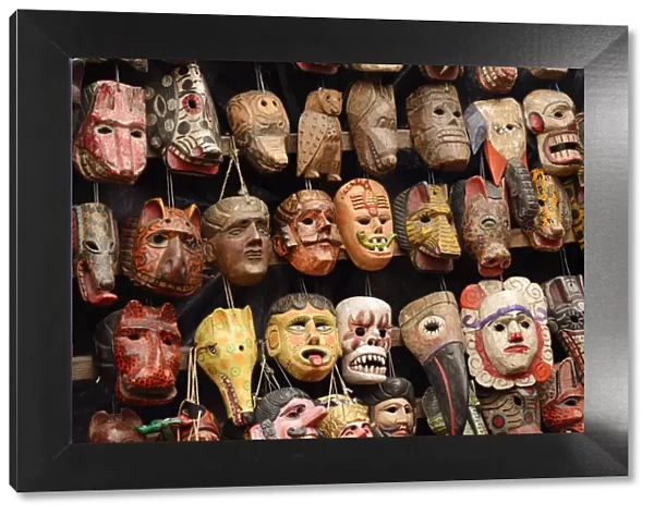 Carved masks for sale in Chichicastenango, Guatemala, Central America