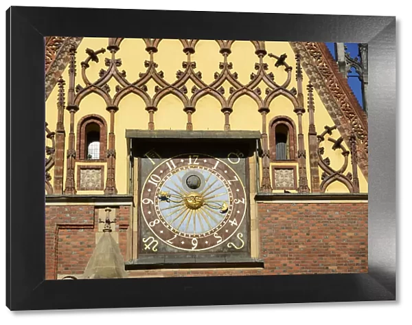 The clock of the gothic Old Town Hall (Stary Ratusz) at the Rynek (Market Square)