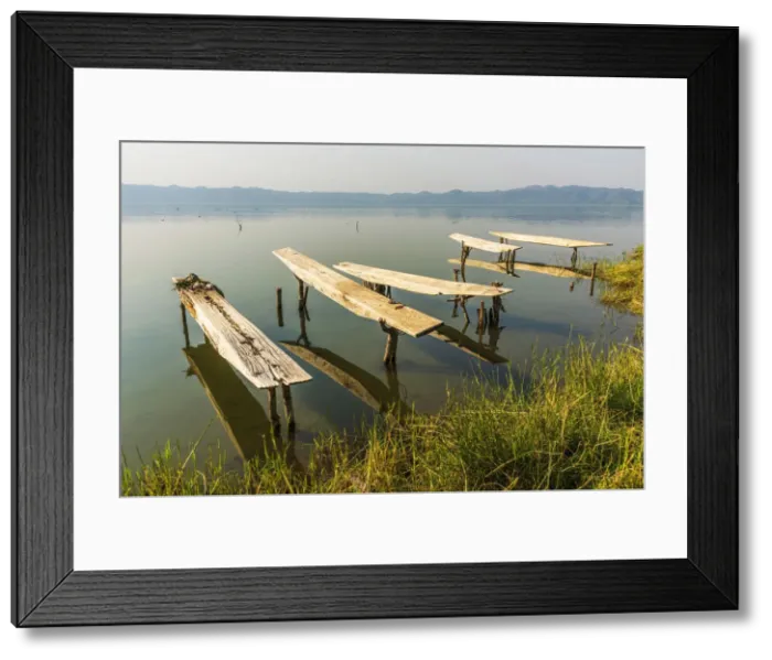 Framed Print : Africa, Ghana, Lake Bosomtwe. The Ashanti people only fish from the traditional wooden Framed Print : Africa, Ghana, Lake Bosomtwe. The Ashanti people only fish from the traditional wooden