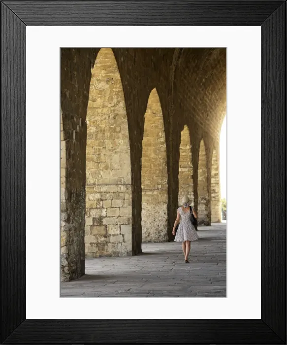 Framed Print : Woman walking along the Venetian shipyard, Heraklion, Crete, Greece, Europe MR 0009