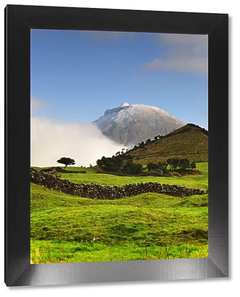 The volcano covered with snow, 2351 meters high, at the Pico island