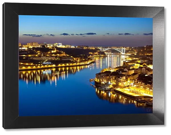 Oporto, capital of the Port wine, with the Douro river at sunset, Portugal