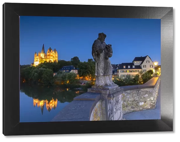Statue on Old Lahn Bridge (Alte Lahnbrucke), Cathedral (Dom) and River Lahn at dusk