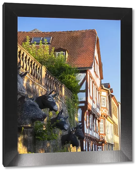 Sculptures of animal heads and half-timbered buildings, Marburg, Hesse, Germany