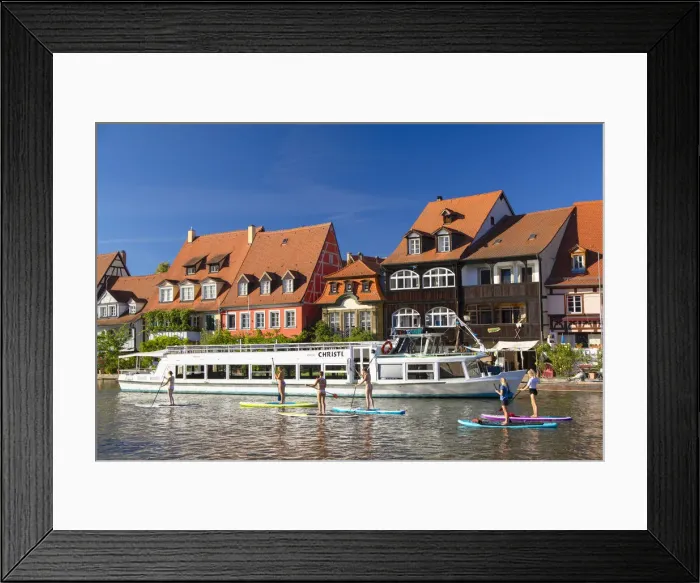 Framed Print : Women paddleboarding past houses of Klein Venedig (Little Venice), Bamberg (UNESCO Framed Print : Women paddleboarding past houses of Klein Venedig (Little Venice), Bamberg (UNESCO