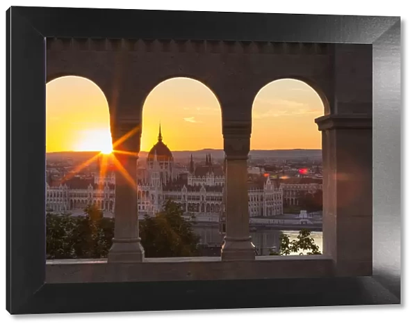 Hungary, Central Hungary, Budapest. Sunrise over the Hungarian Parliament Building