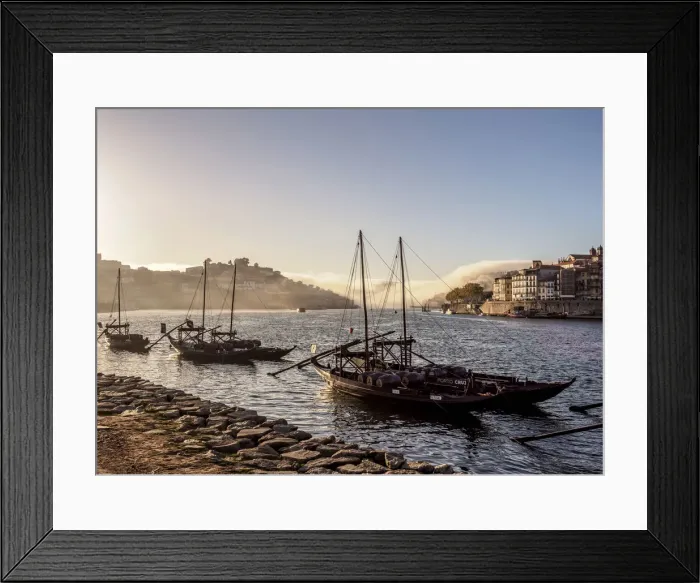 Framed Print : Traditional boats on Vila Nova de Gaia bank of Douro River, Porto Skyline in Framed Print : Traditional boats on Vila Nova de Gaia bank of Douro River, Porto Skyline in