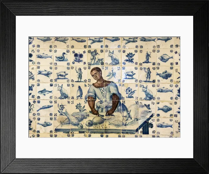 Framed Print : Tiles representing a black woman preparing fish Framed Print : Tiles representing a black woman preparing fish