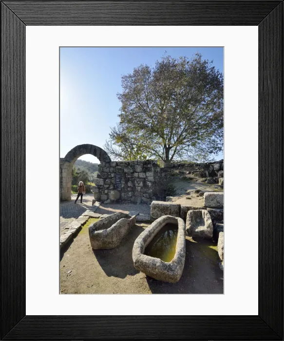Framed Print : The roman, medieval walls and stone tombs in the historic village of Idanha a Velha