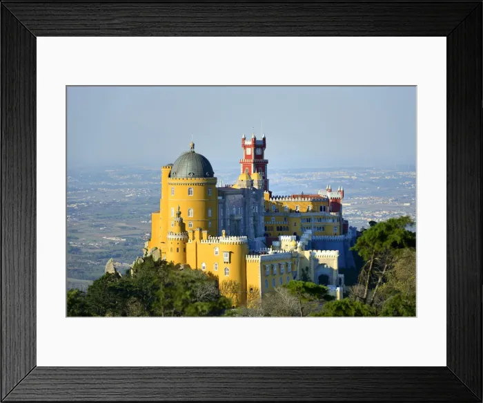 Framed Print : Palacio da Pena, built in the 19th century on the hills above Sintra, in the middle Framed Print : Palacio da Pena, built in the 19th century on the hills above Sintra, in the middle