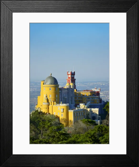 Framed Print : Palacio da Pena, built in the 19th century on the hills above Sintra, in the middle Framed Print : Palacio da Pena, built in the 19th century on the hills above Sintra, in the middle