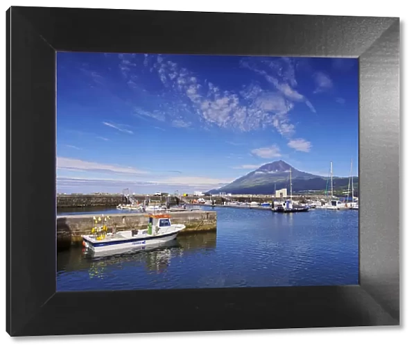 Portugal, Azores, Pico, Lajes do Pico, View of the port with Pico Mountain in the