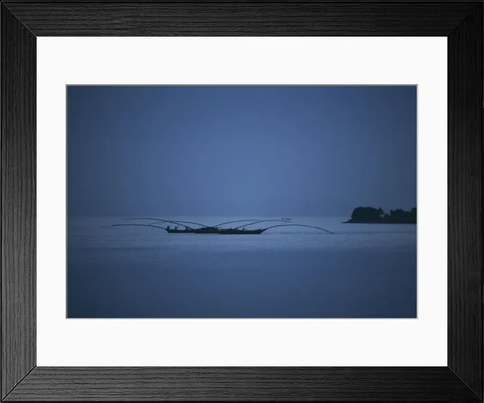 Framed Print : Gisenyi, Rwanda. Night fishermen head out onto lake Kivu with specially adapted boats Framed Print : Gisenyi, Rwanda. Night fishermen head out onto lake Kivu with specially adapted boats