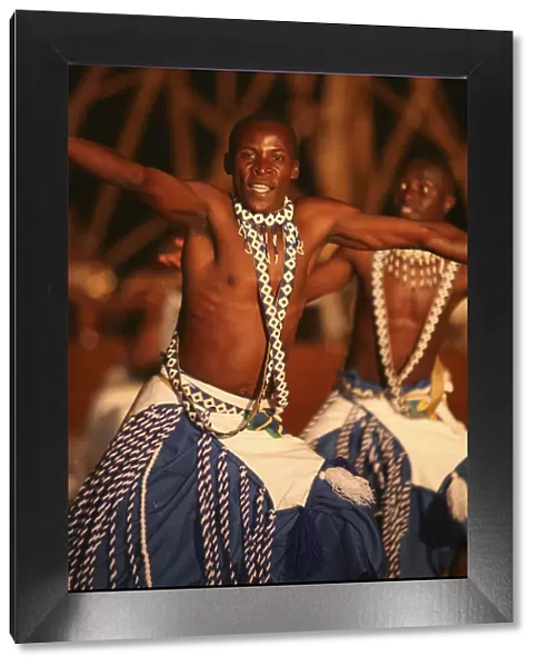 Kigali, Rwanda. A Intore dancer entertains at FESPAD Pan African dance festival