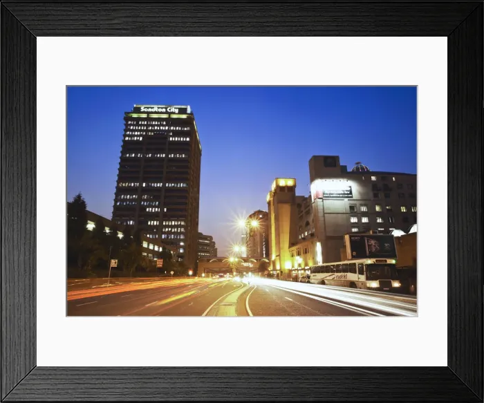 Framed Print : Light trails of traffic passing through downtown Sandton, Johannesburg, Gauteng, South