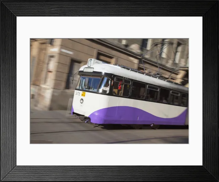 Framed Print : Tram passing along street, Timisoara, Banat, Romania Framed Print : Tram passing along street, Timisoara, Banat, Romania
