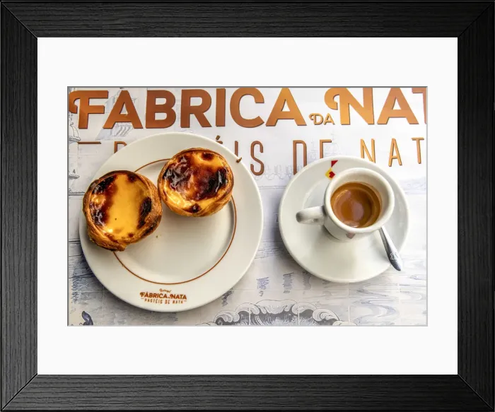 Framed Print : Pastel de belem or pasteis de nata custard tarts served with a cup of coffee in a Framed Print : Pastel de belem or pasteis de nata custard tarts served with a cup of coffee in a