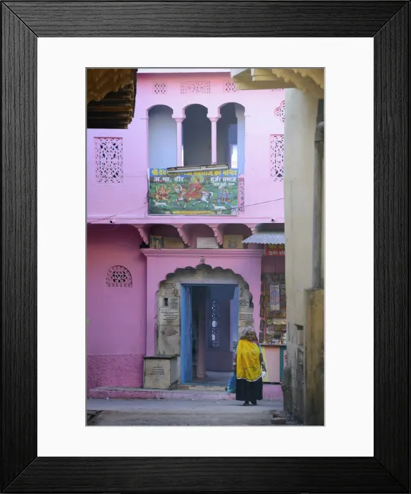Framed Print : Woman walkin in front of colourful house, Pushkar, India, Asia Framed Print : Woman walkin in front of colourful house, Pushkar, India, Asia