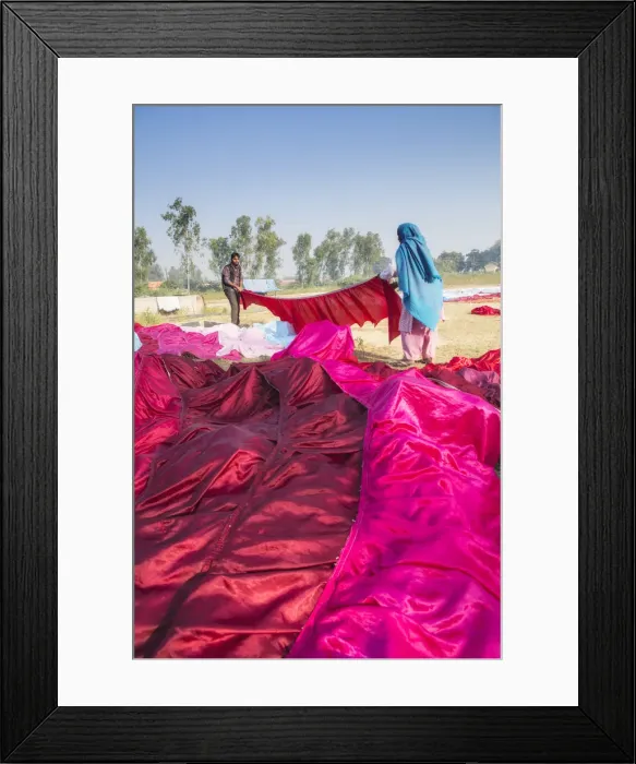 Framed Print : India, Uttar Pradesh, Agra, locals drying brilliant red and pink sarees in the sun Framed Print : India, Uttar Pradesh, Agra, locals drying brilliant red and pink sarees in the sun