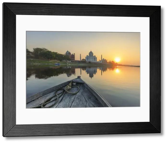 Framed Print : India, view of the Taj Mahal reflecting in the Yamuna river at sunset from a wooden boat Framed Print : India, view of the Taj Mahal reflecting in the Yamuna river at sunset from a wooden boat