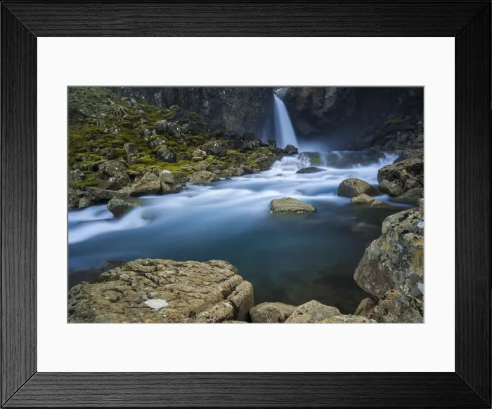 Framed Print : Scenic view of Folaldafoss waterfall flowing through rocks, Sledbrjotur, East Iceland Framed Print : Scenic view of Folaldafoss waterfall flowing through rocks, Sledbrjotur, East Iceland