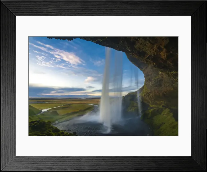 Framed Print : Seljalandsfoss waterfall seen from under cliff overhang during sunset, South Iceland Framed Print : Seljalandsfoss waterfall seen from under cliff overhang during sunset, South Iceland