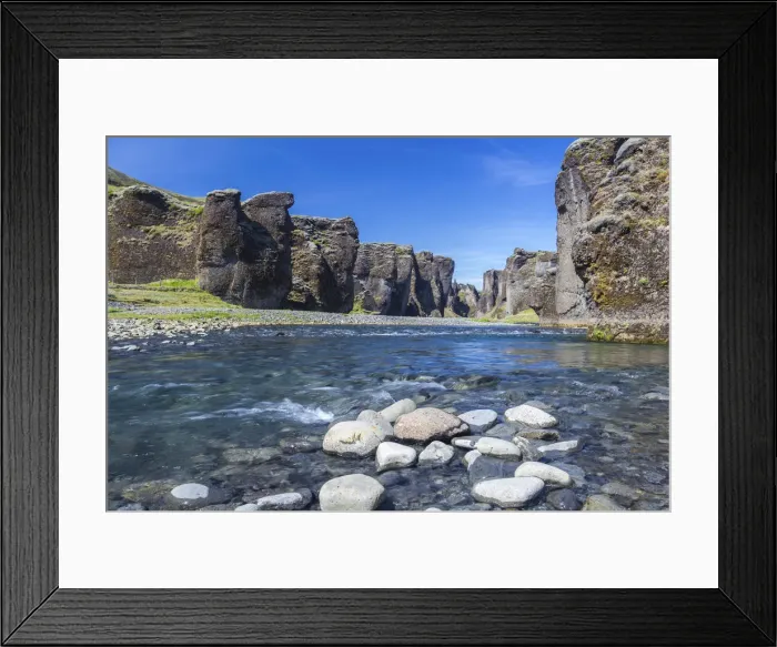 Framed Print : Fjadra River flowing through rocks against cliffs in Fjadrargljufur canyon on sunny day Framed Print : Fjadra River flowing through rocks against cliffs in Fjadrargljufur canyon on sunny day