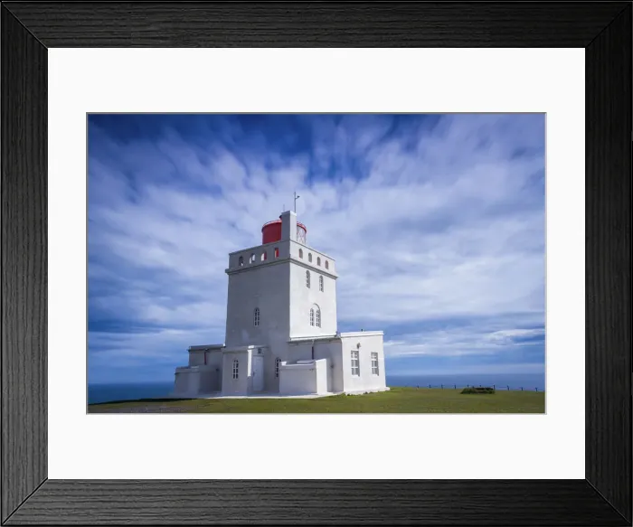 Framed Print : Concrete Dyrholaey Lighthouse against cloudy sky at Dyrholaey, South Iceland, Iceland Framed Print : Concrete Dyrholaey Lighthouse against cloudy sky at Dyrholaey, South Iceland, Iceland