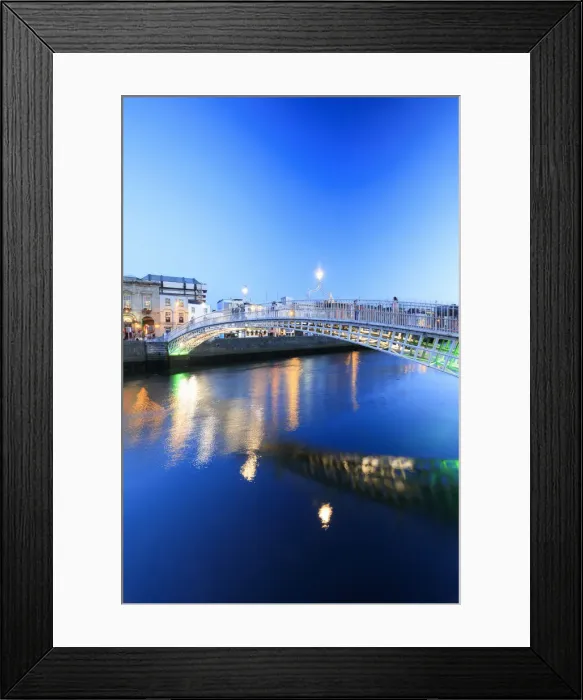Framed Print : Europe, Dublin, Ireland, Halfpenny bridge by night reflecting on the Liffey river Framed Print : Europe, Dublin, Ireland, Halfpenny bridge by night reflecting on the Liffey river