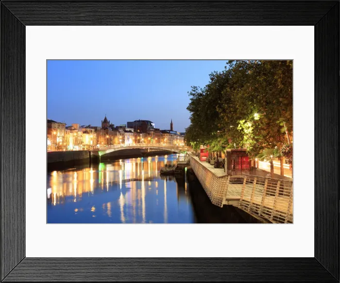 Framed Print : Europe, Dublin, Ireland, Halfpenny bridge by night reflecting on the Liffey river Framed Print : Europe, Dublin, Ireland, Halfpenny bridge by night reflecting on the Liffey river