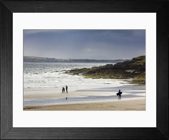 Framed Print : Europe, Kinsale, a surfer and toursits at sunset on the beach near Laherne Hill Framed Print : Europe, Kinsale, a surfer and toursits at sunset on the beach near Laherne Hill