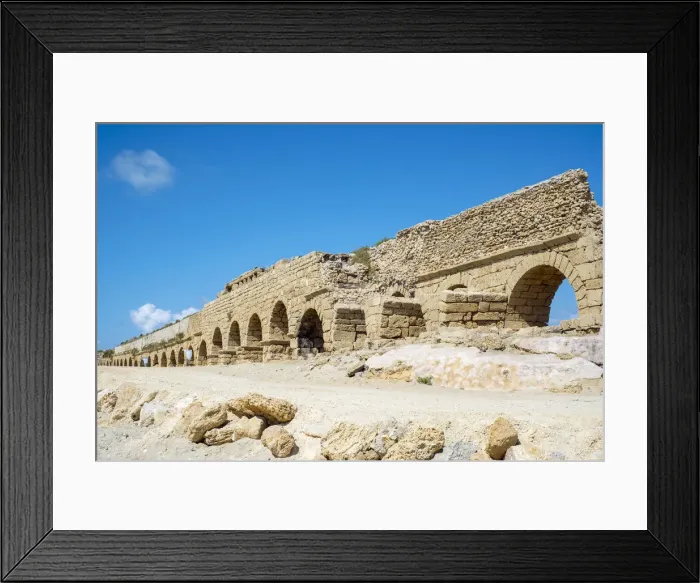 Framed Print : Israel, Haifa District, Caesaria. Ruins of Roman aqueduct on the beach along Framed Print : Israel, Haifa District, Caesaria. Ruins of Roman aqueduct on the beach along