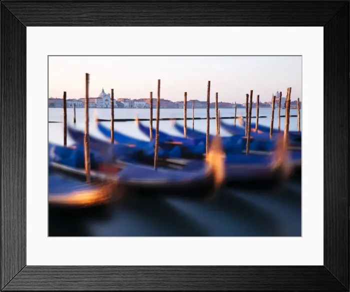 Framed Print : Traditional Venetian gondolas and mooring poles at dawn, Venice, Veneto region, Italy Framed Print : Traditional Venetian gondolas and mooring poles at dawn, Venice, Veneto region, Italy