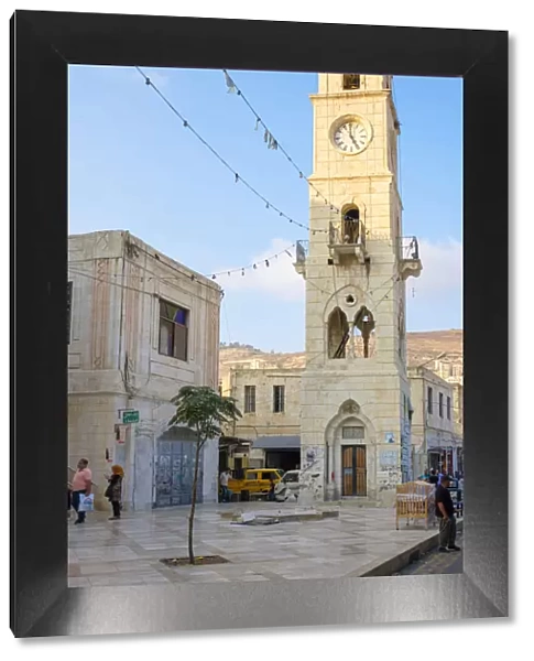 Palestine, West Bank, Nablus. Belltower in front of An-Nasr Mosque (Masjid an-Nasr)