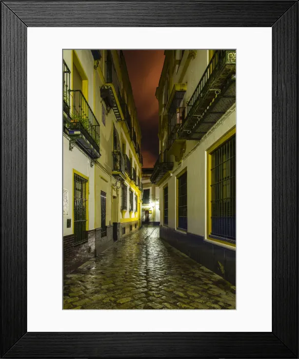 Framed Print : Night view of an empty street in Barrio Santa Cruz, Seville, Andalusia, Spain