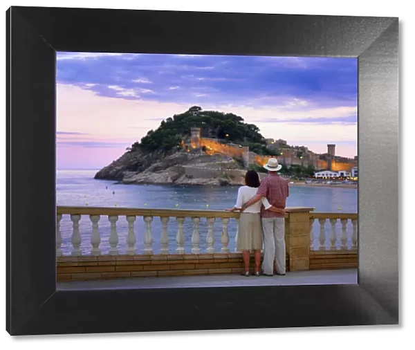 Spain, Catalonia, Costa Brava, Tossa de Mar, man and woman looking at view (MR)