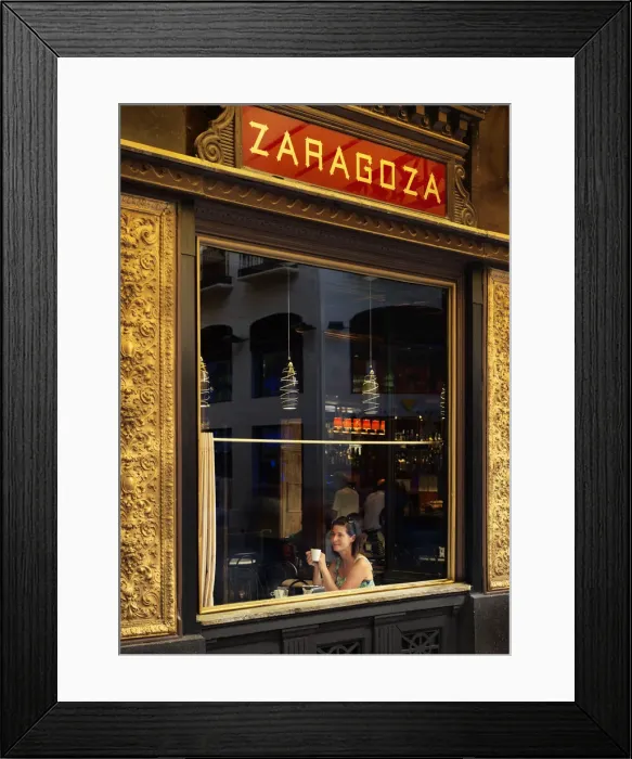 Framed Print : Spain, Aragon Region, Zaragoza, Woman driking coffee in Cafe (MR) Framed Print : Spain, Aragon Region, Zaragoza, Woman driking coffee in Cafe (MR)