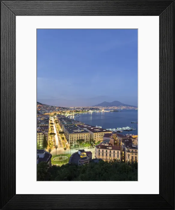 Framed Print : Naples, Campania, Italy. View of the bay by night and Mount Vesuvius Volcano in background