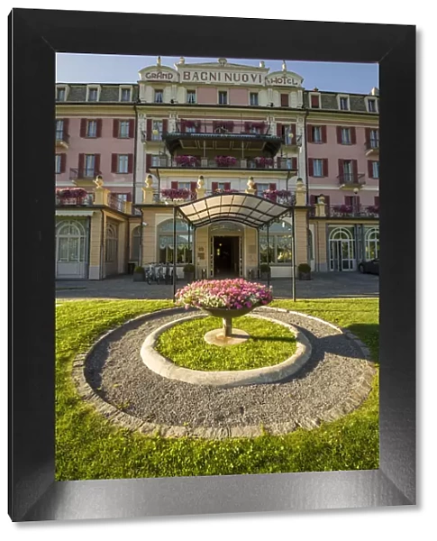Bagni Nuovi, Bormio, Valtellina, Lombardy, Italy. Luxury Grand Hotel at sunset